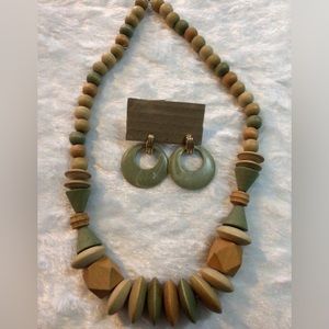 Woman’s wooden beaded necklace and clip earrings set